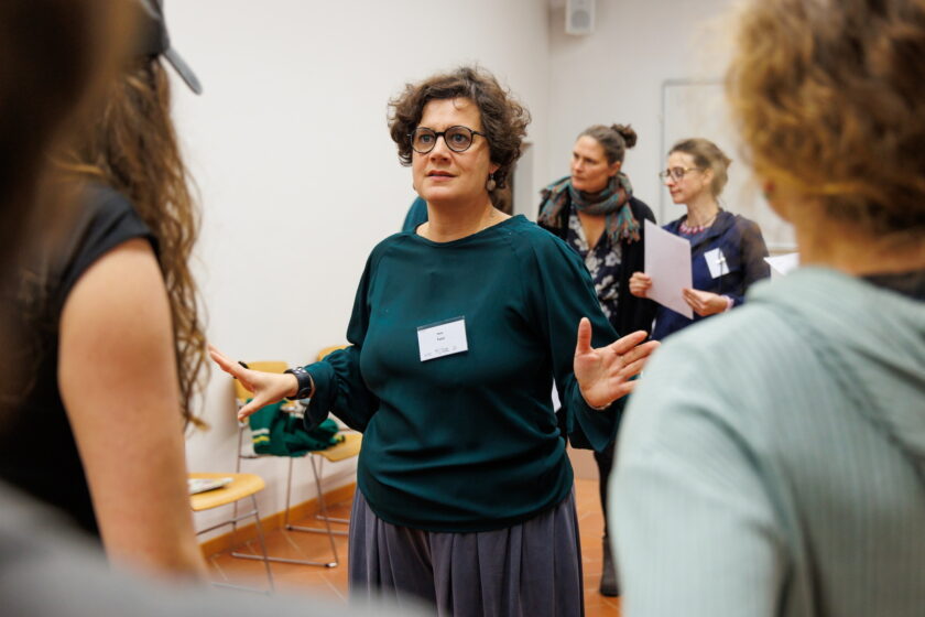 Ilaria Tucci while she is facilitating a workshop during the European Peace Research conference in Pisa (Italy), November 2024. In the picture are Ilaria Tucci and some of the workshop participants. Photo by Enrico Mattia Del Punta